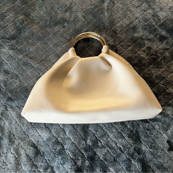 Urban Pipeline Cream Clutch with Silver Handle